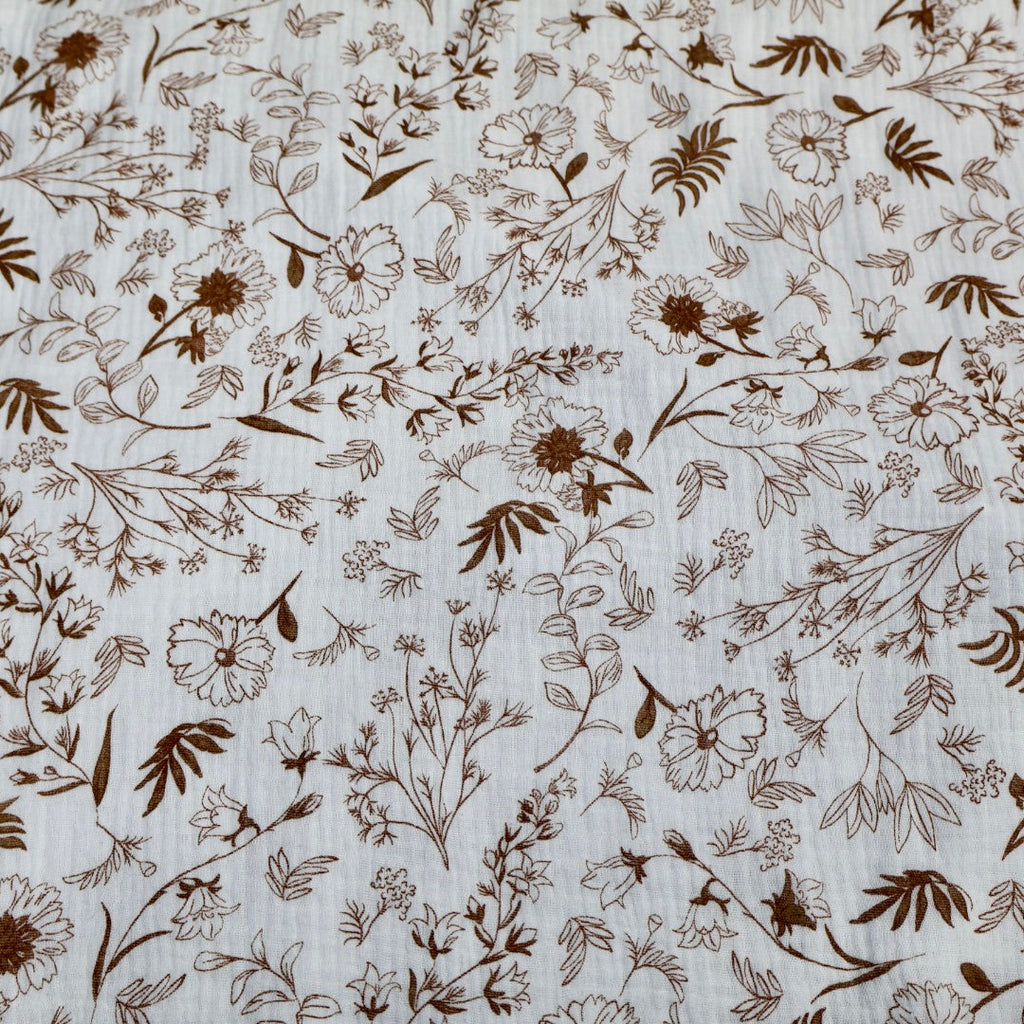 Tissu gaze de coton blanche et marron