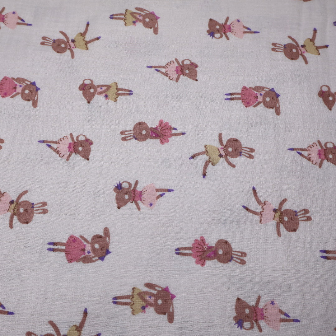 Tissu gaze de coton rose imprimé