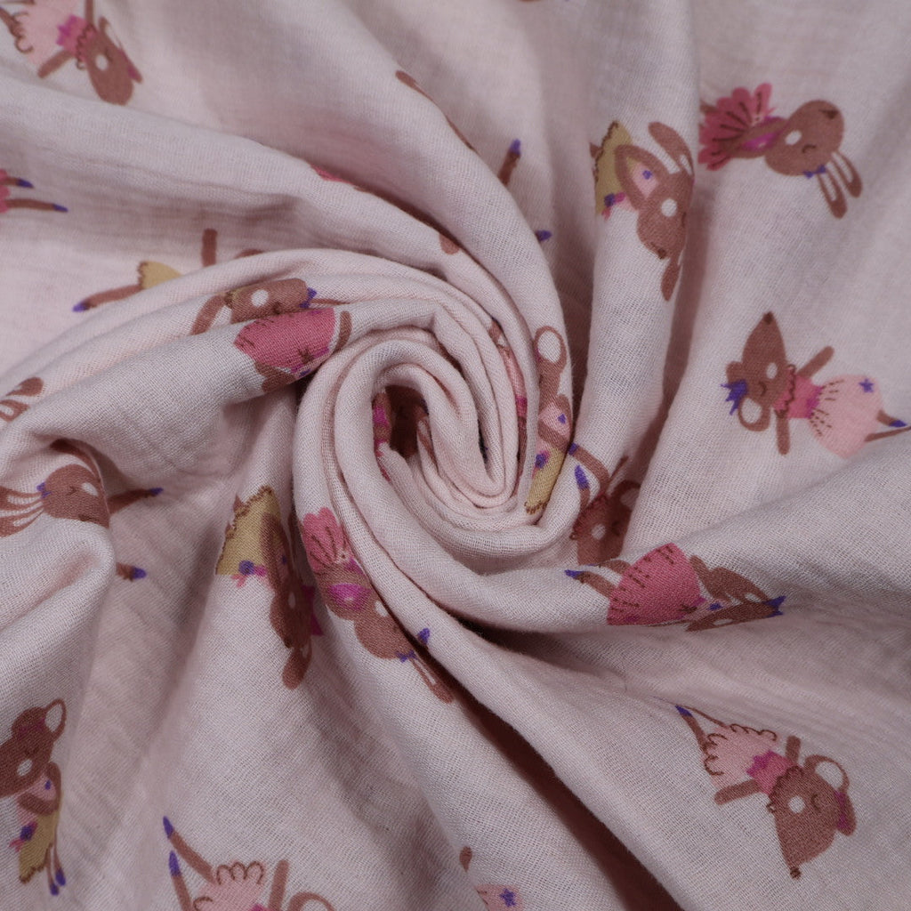 Tissu gaze de coton rose imprimé