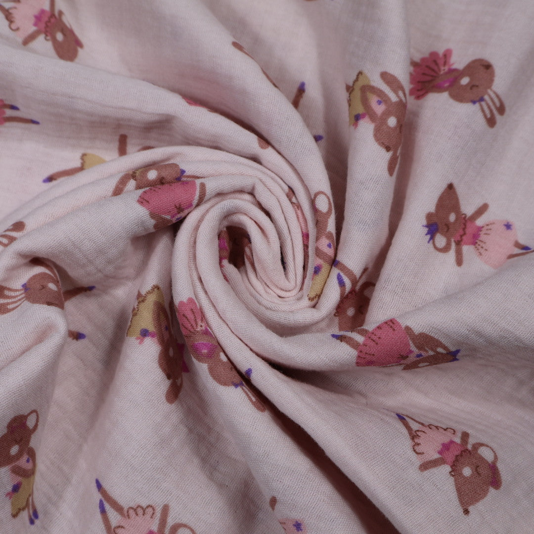 Tissu gaze de coton rose imprimé