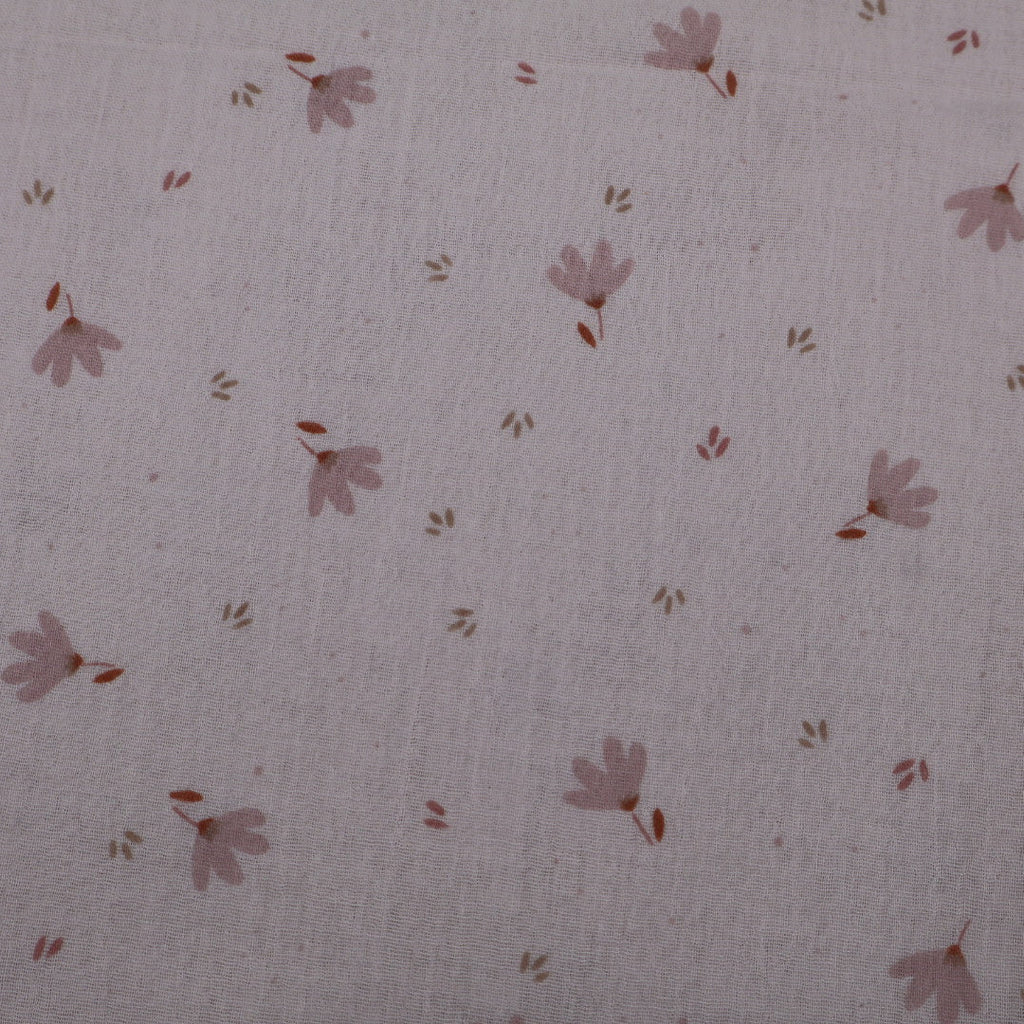 Tissu gaze de coton imprimé rose