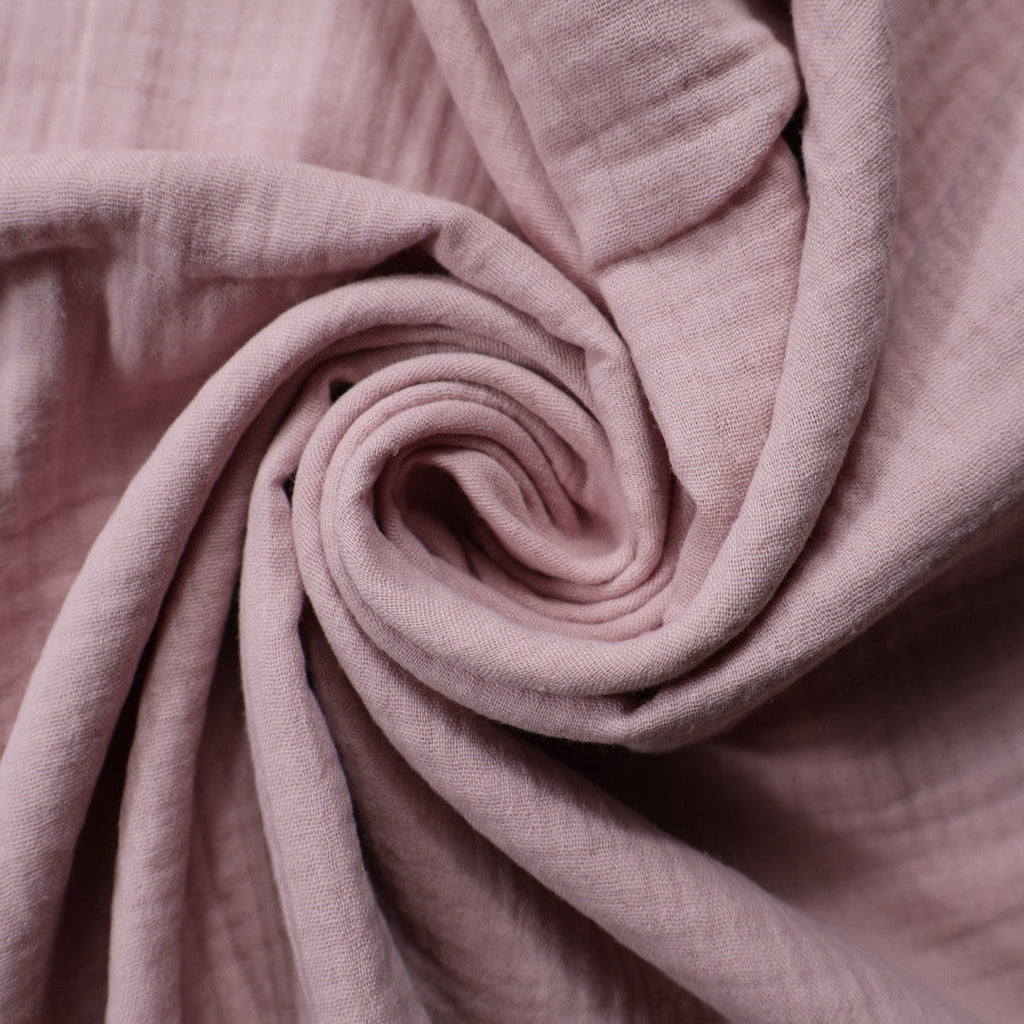 Tissu gaze de coton rose poudré