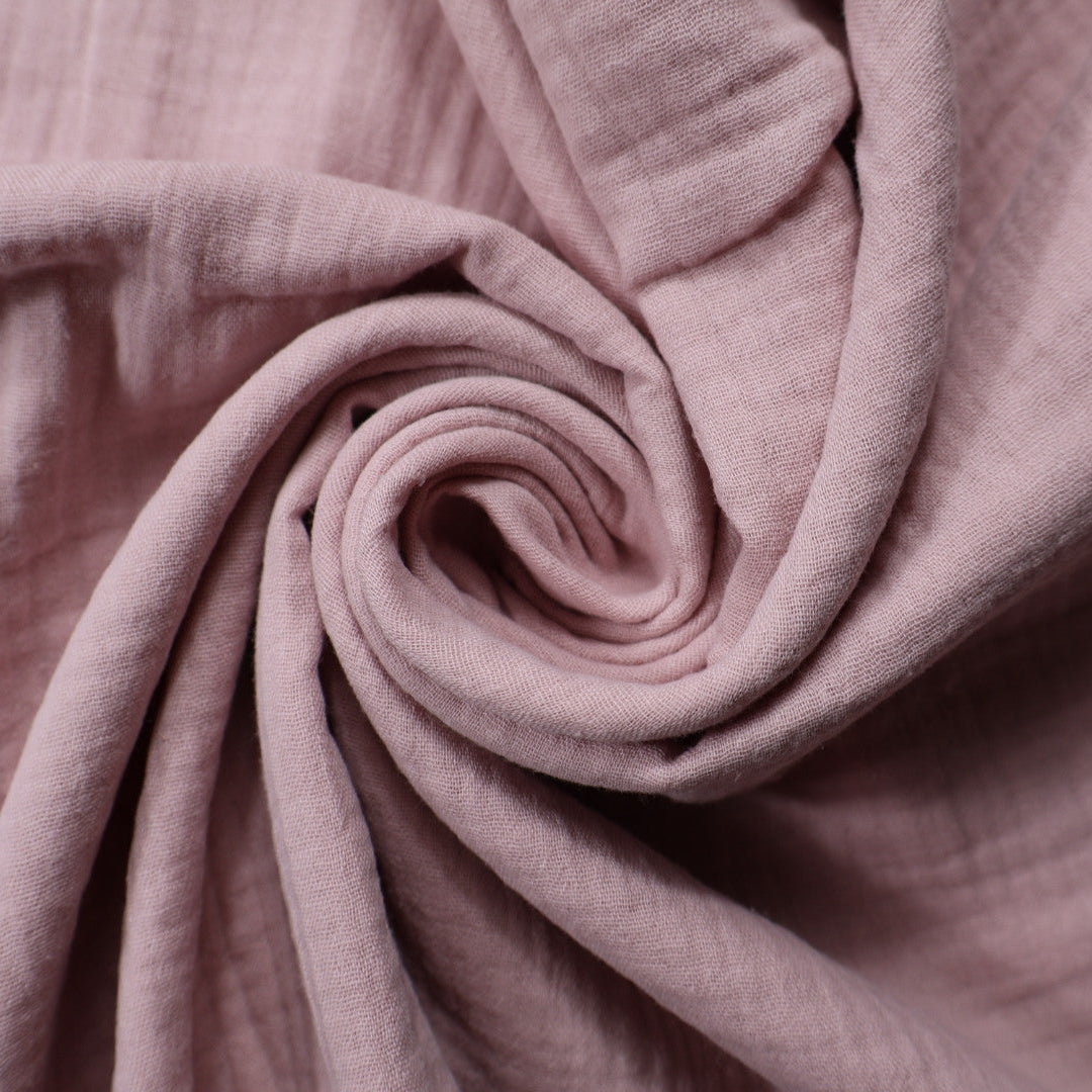 Tissu gaze de coton rose poudré